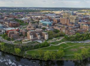 Aerial view of the east bank campus, including Comsotck and Yudof halls